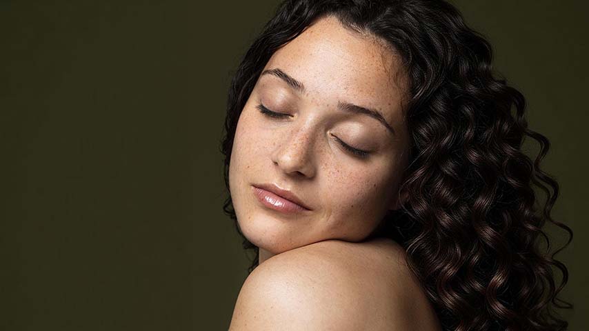 how to remove age spots naturally - age spots visible on a woman's face